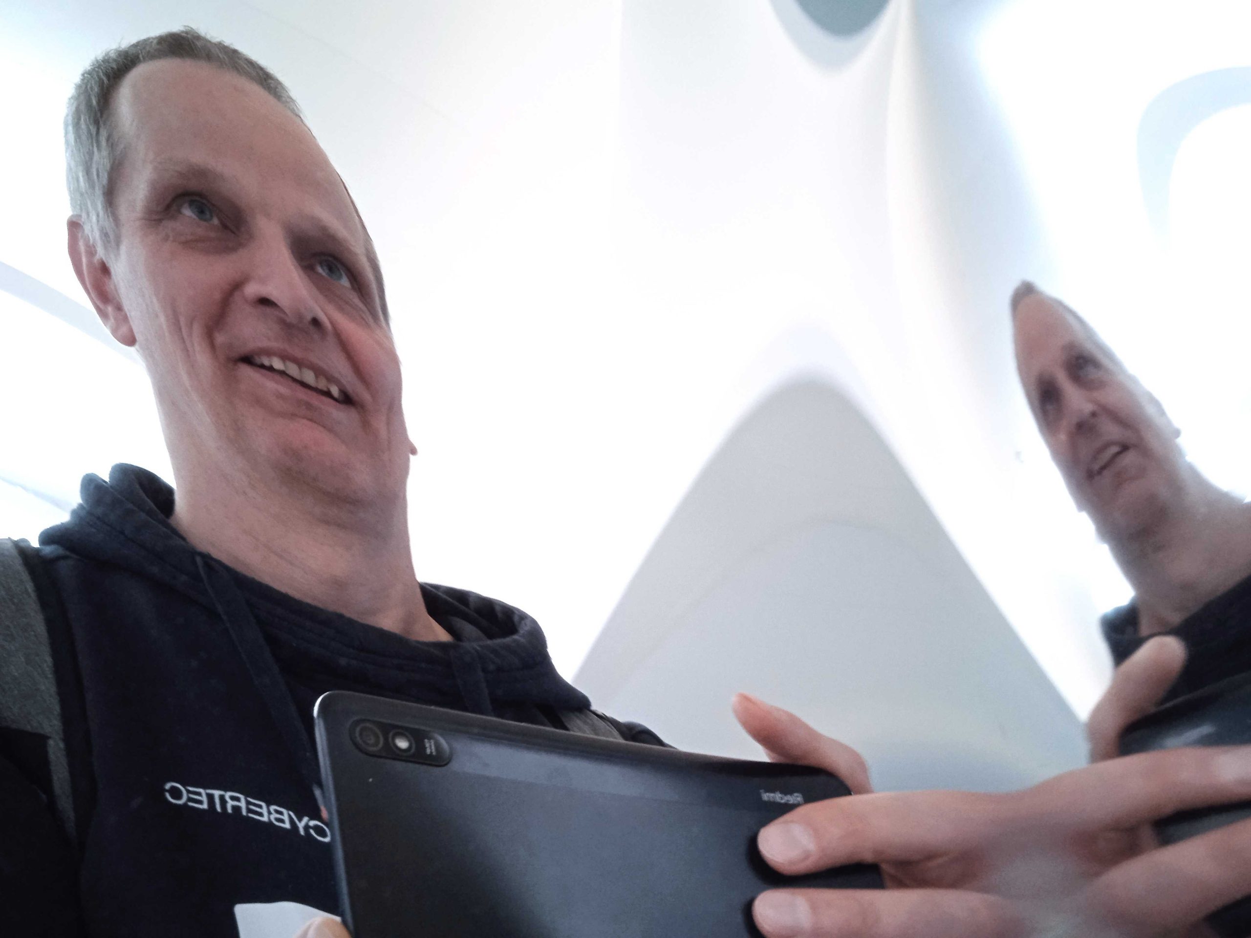 A selfie of myself in a distorting mirror at the Swiss Database Synergy Day 2025